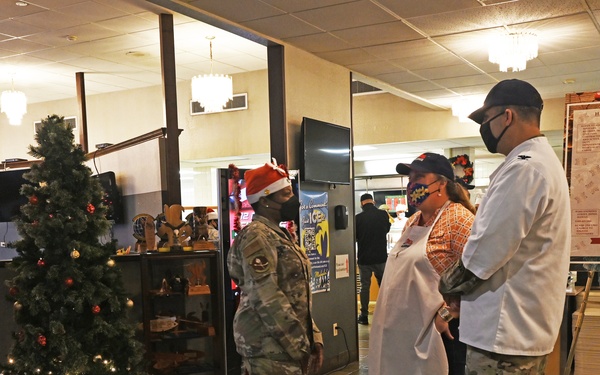 15th Wing Leadership serves Christmas eve lunch