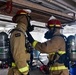 Coast Guard Cutter Polar Star crew members conduct shipboard firefighting drills