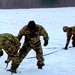 Cold-Weather Operations Course class 22-02 students learn about Arctic tent on snowy training day