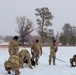 Cold-Weather Operations Course class 22-02 students learn about Arctic tent on snowy training day