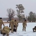 Cold-Weather Operations Course class 22-02 students learn about Arctic tent on snowy training day