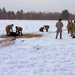 Cold-Weather Operations Course class 22-02 students learn about Arctic tent on snowy training day