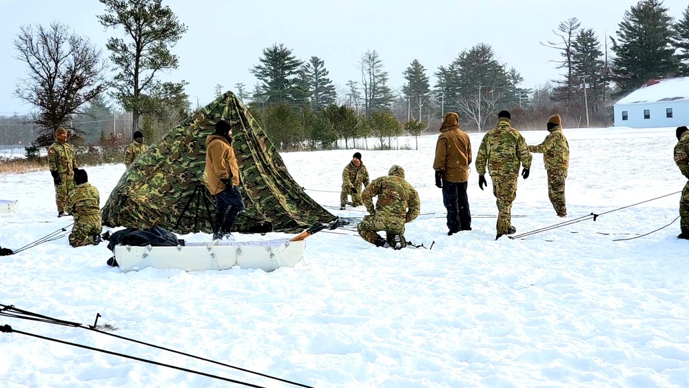 Cold-Weather Operations Course class 22-02 students learn about Arctic tent on snowy training day