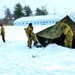 Cold-Weather Operations Course class 22-02 students learn about Arctic tent on snowy training day