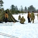 Cold-Weather Operations Course class 22-02 students learn about Arctic tent on snowy training day