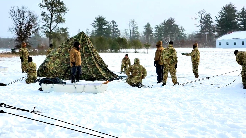 Cold-Weather Operations Course class 22-02 students learn about Arctic tent on snowy training day