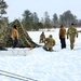 Cold-Weather Operations Course class 22-02 students learn about Arctic tent on snowy training day