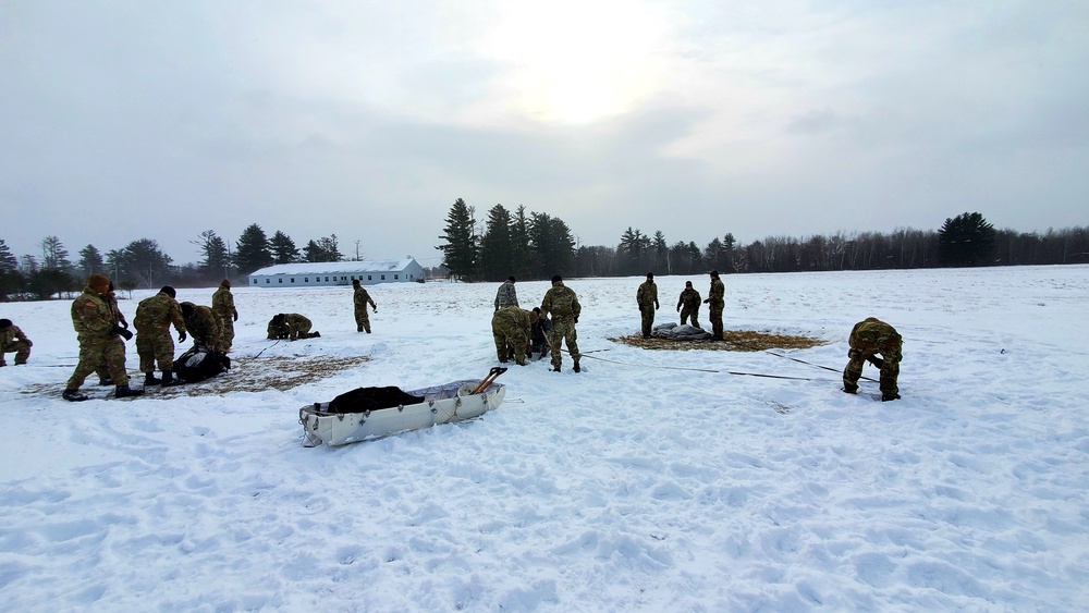 Cold-Weather Operations Course class 22-02 students learn about Arctic tent on snowy training day