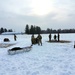 Cold-Weather Operations Course class 22-02 students learn about Arctic tent on snowy training day