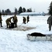 Cold-Weather Operations Course class 22-02 students learn about Arctic tent on snowy training day