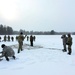 Cold-Weather Operations Course class 22-02 students learn about Arctic tent on snowy training day