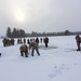 Cold-Weather Operations Course class 22-02 students learn about Arctic tent on snowy training day