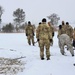 Cold-Weather Operations Course class 22-02 students learn about Arctic tent on snowy training day