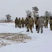 Cold-Weather Operations Course class 22-02 students learn about Arctic tent on snowy training day