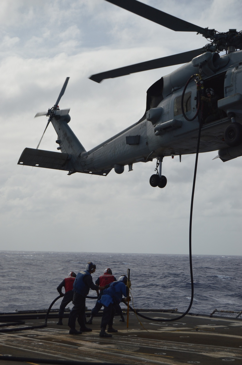 Helicopter Maritime Squadron (HSM) 78 conducts in-flight refueling drills in Philippine Sea