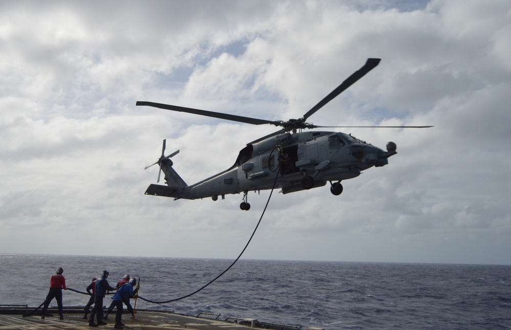 Helicopter Maritime Squadron (HSM) 78 conducts in-flight refueling drills in Philippine Sea