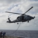 Helicopter Maritime Squadron (HSM) 78 conducts in-flight refueling drills in Philippine Sea