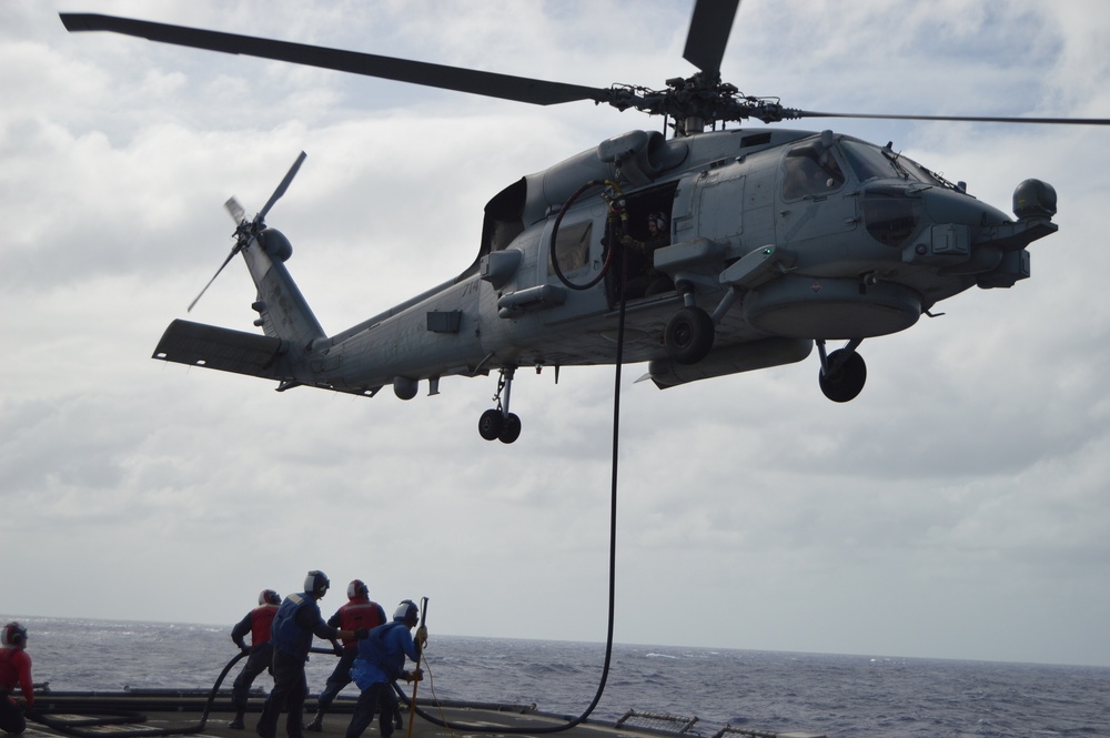 Helicopter Maritime Squadron (HSM) 78 conducts in-flight refueling drills in Philippine Sea