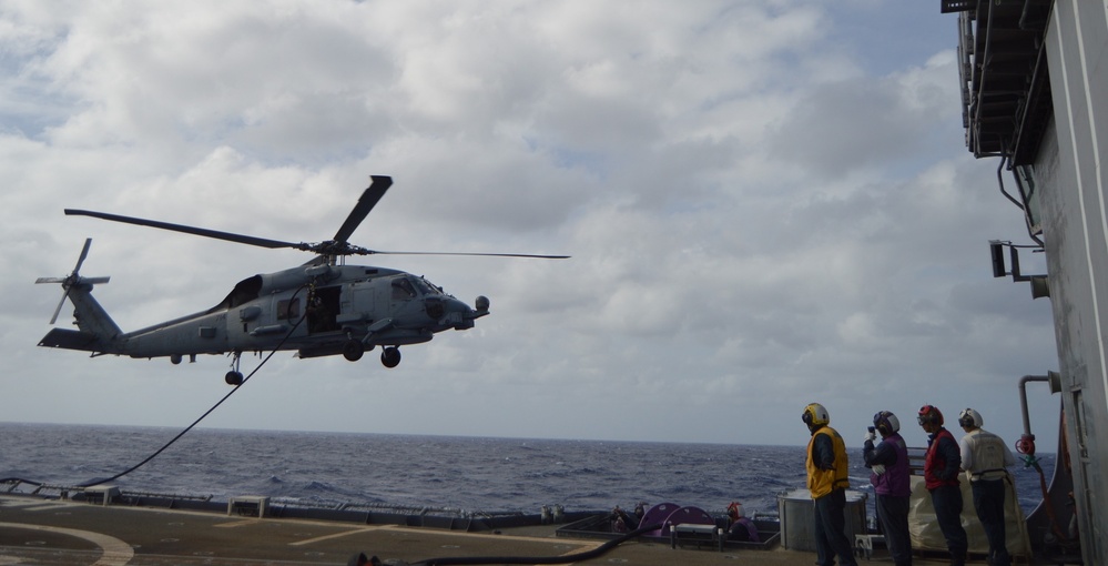 Helicopter Maritime Squadron (HSM) 78 conducts in-flight refueling drills in Philippine Sea