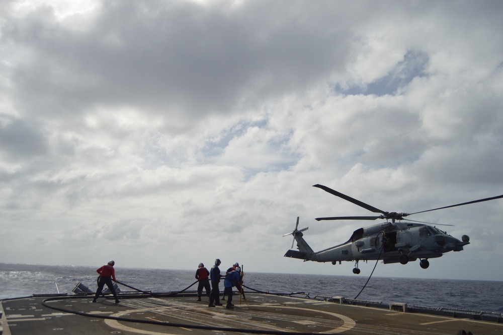 Helicopter Maritime Squadron (HSM) 78 conducts in-flight refueling drills in Philippine Sea