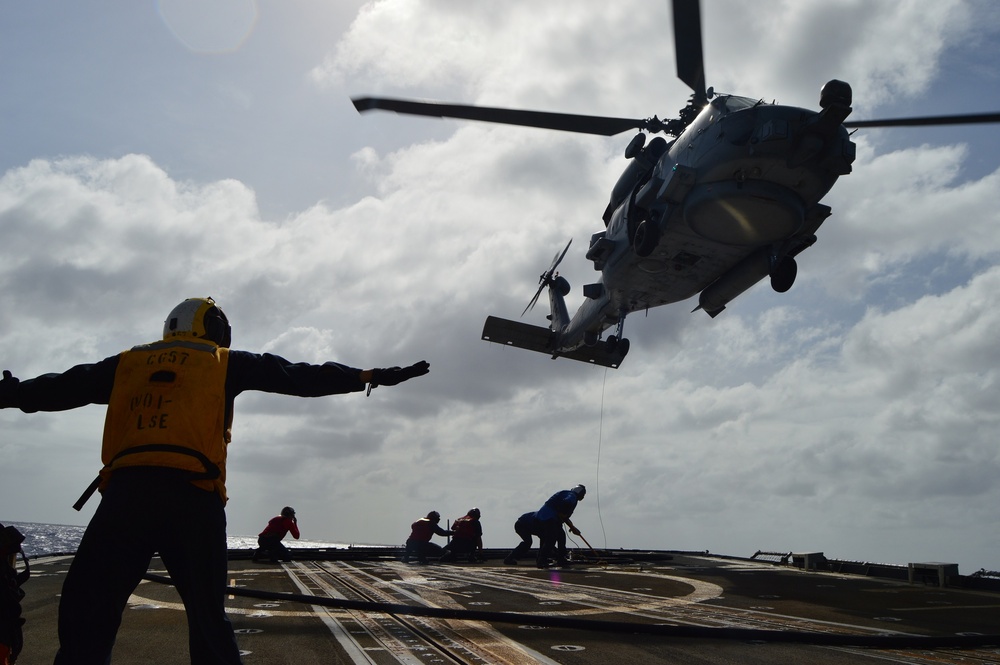 Helicopter Maritime Squadron (HSM) 78 conducts in-flight refueling drills in Philippine Sea