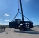 US Navy Seabees with NMCB-5 load a grader for equipment disposition onboard Camp Shields