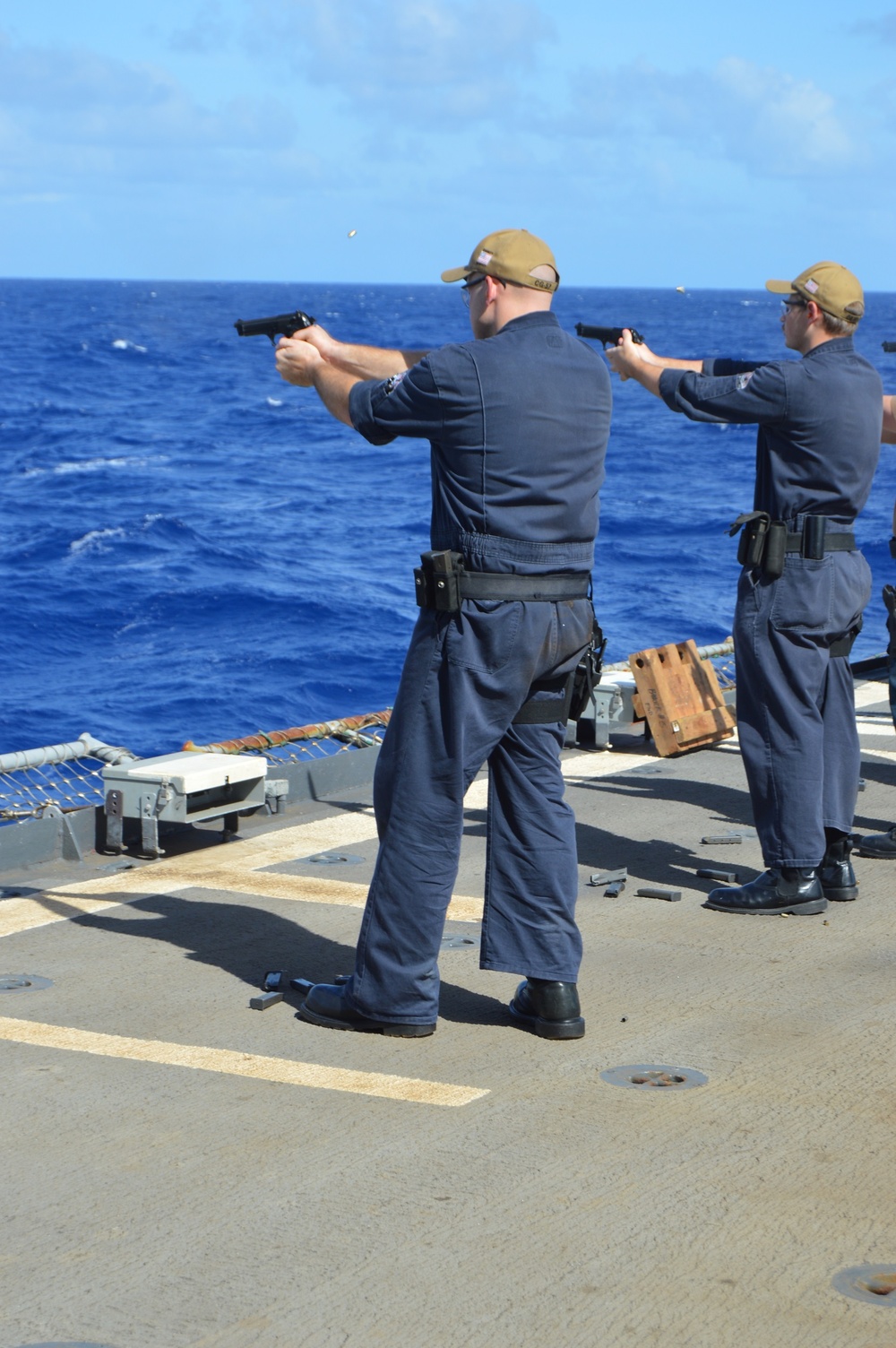 Sailors aboard USS Lake Champlain undergo small arms qualifications