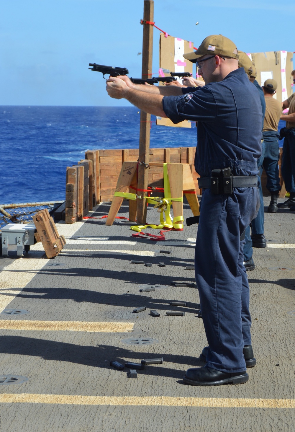 Sailors aboard USS Lake Champlain undergo small arms qualifications