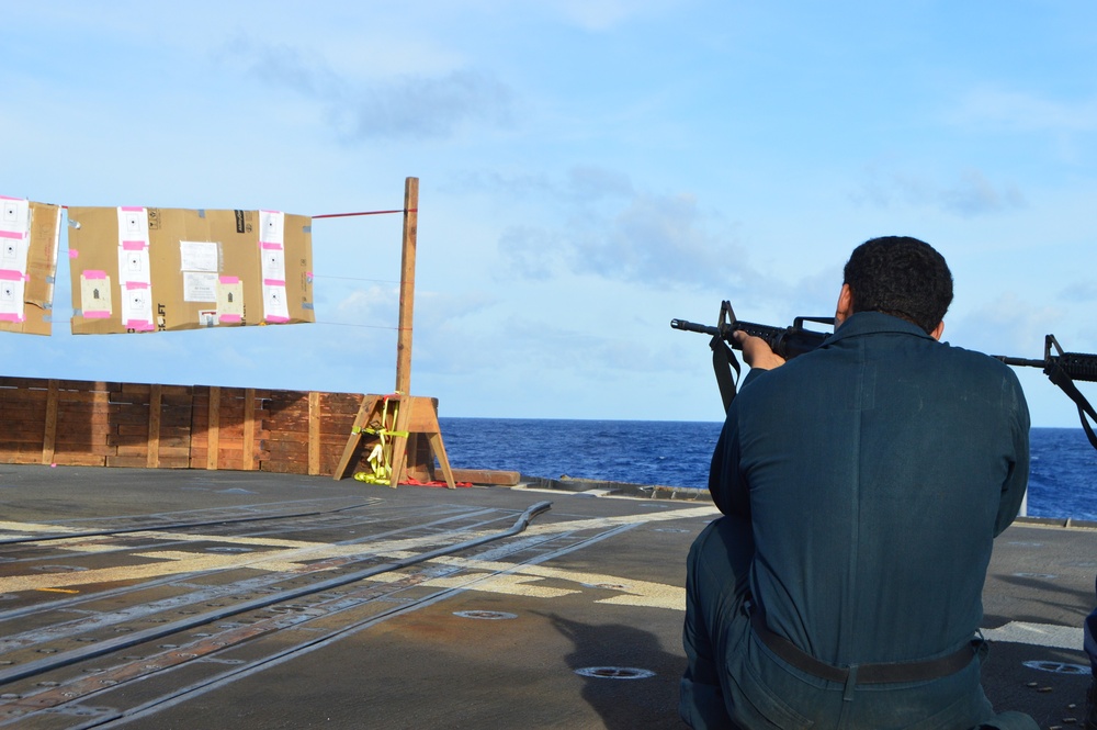 Sailors aboard USS Lake Champlain undergo small arms qualifications