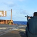 Sailors aboard USS Lake Champlain undergo small arms qualifications