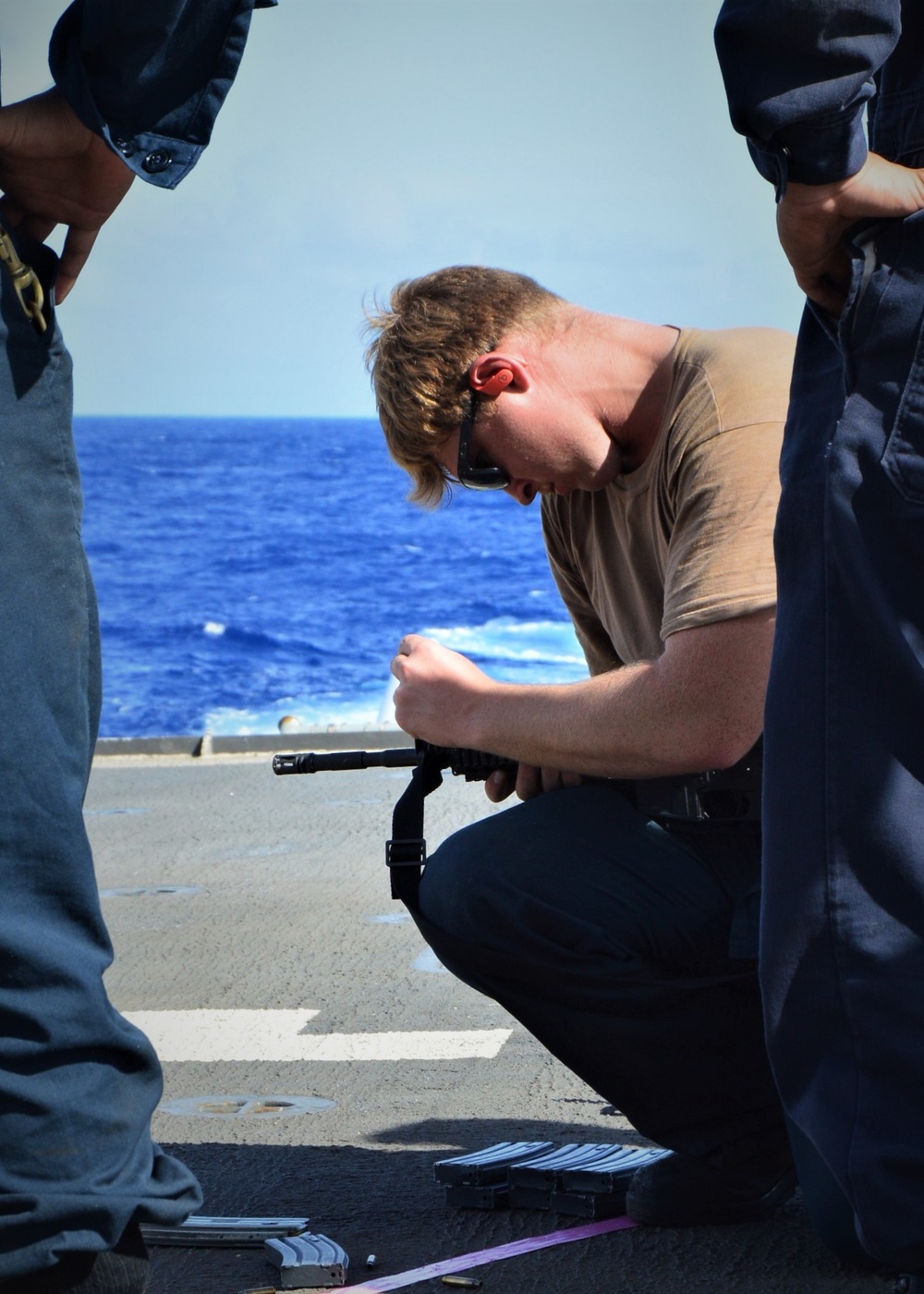 Sailors aboard USS Lake Champlain undergo small arms qualifications