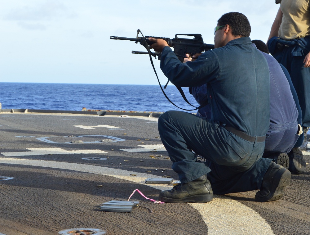 Sailors aboard USS Lake Champlain undergo small arms qualifications