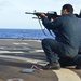 Sailors aboard USS Lake Champlain undergo small arms qualifications