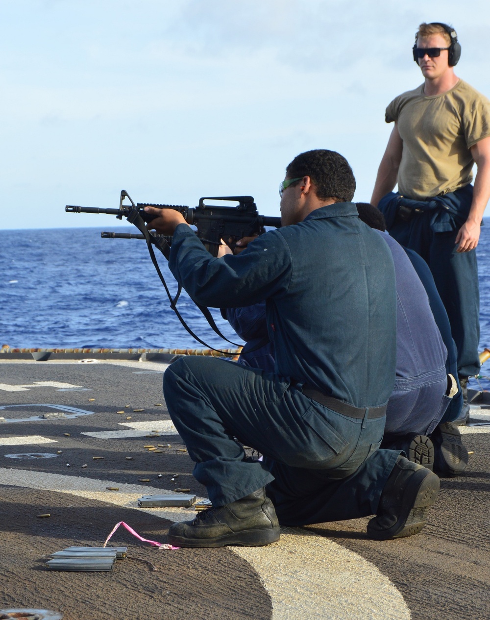 Sailors aboard USS Lake Champlain undergo small arms qualifications