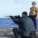 Sailors aboard USS Lake Champlain undergo small arms qualifications