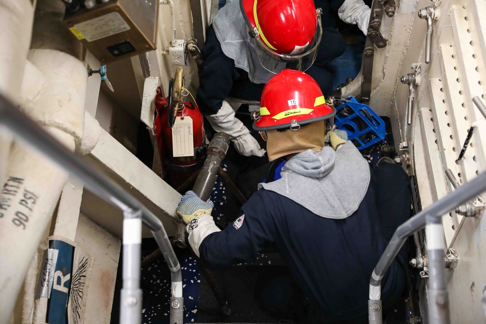 USS Ross conducts damage control drill