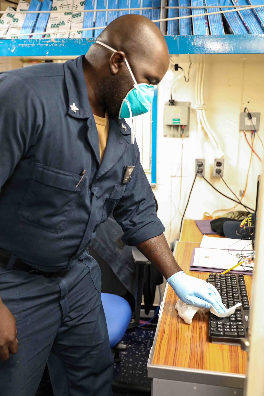 USS Ross Sailors keep the ship clean