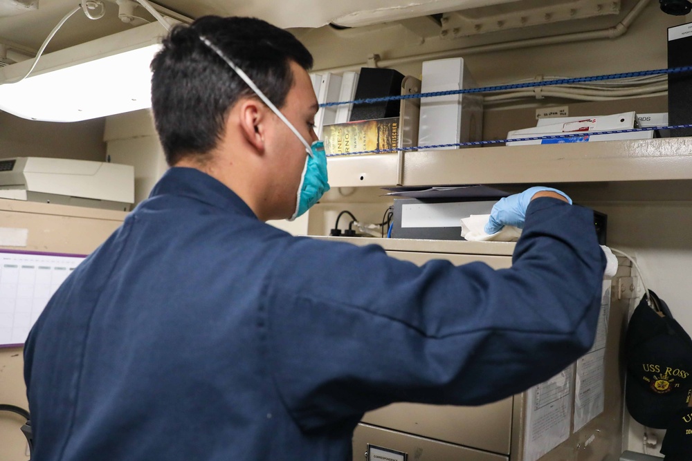 USS Ross Sailors keep the ship clean