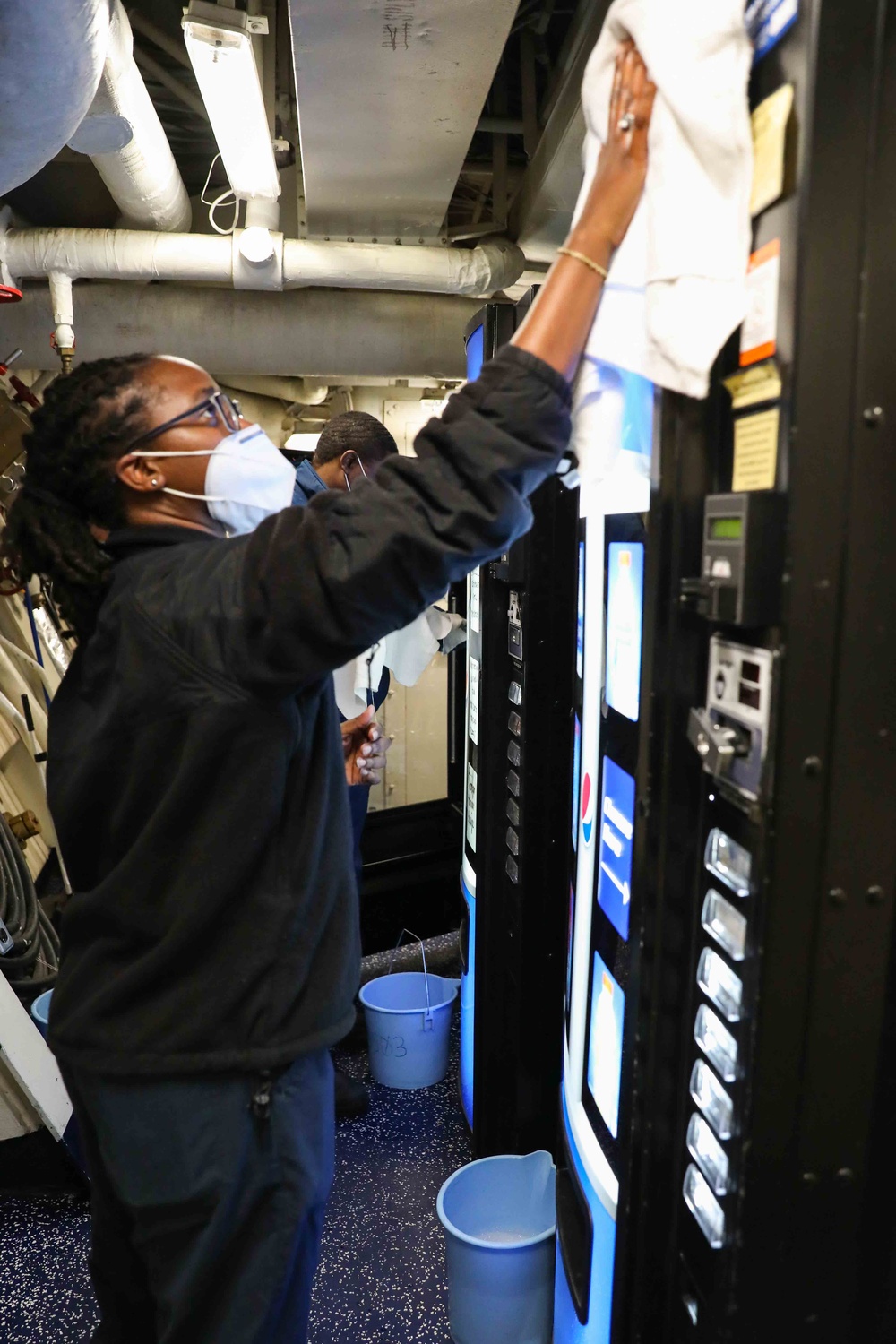 USS Ross Sailors keep the ship clean