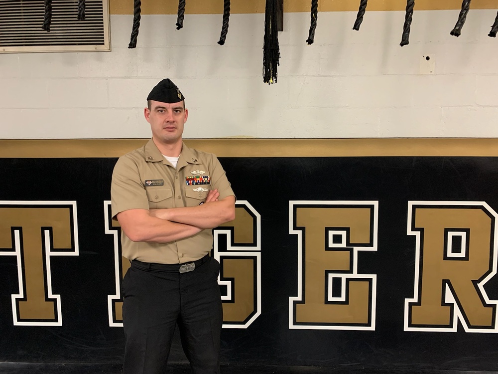 Navy Sailor Coaches Wrestling to Come Out on Top