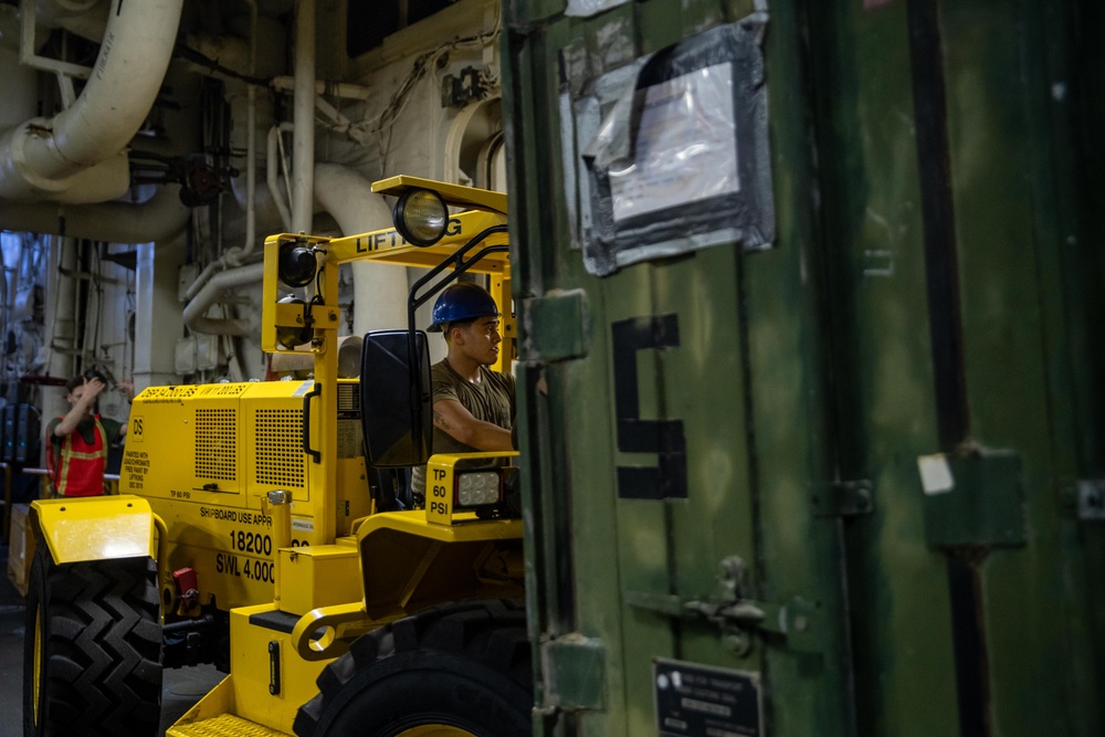 11th MEU Marines conduct forklift operations aboard USS Essex (LHD 2)