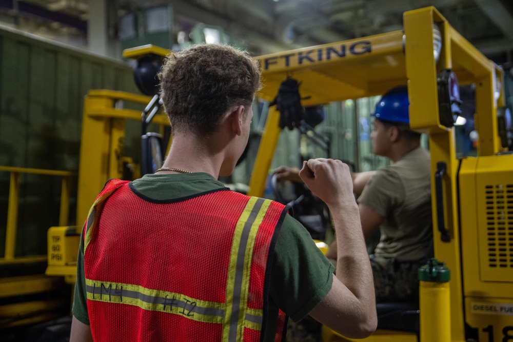 11th MEU Marines conduct forklift operations aboard USS Essex (LHD 2)