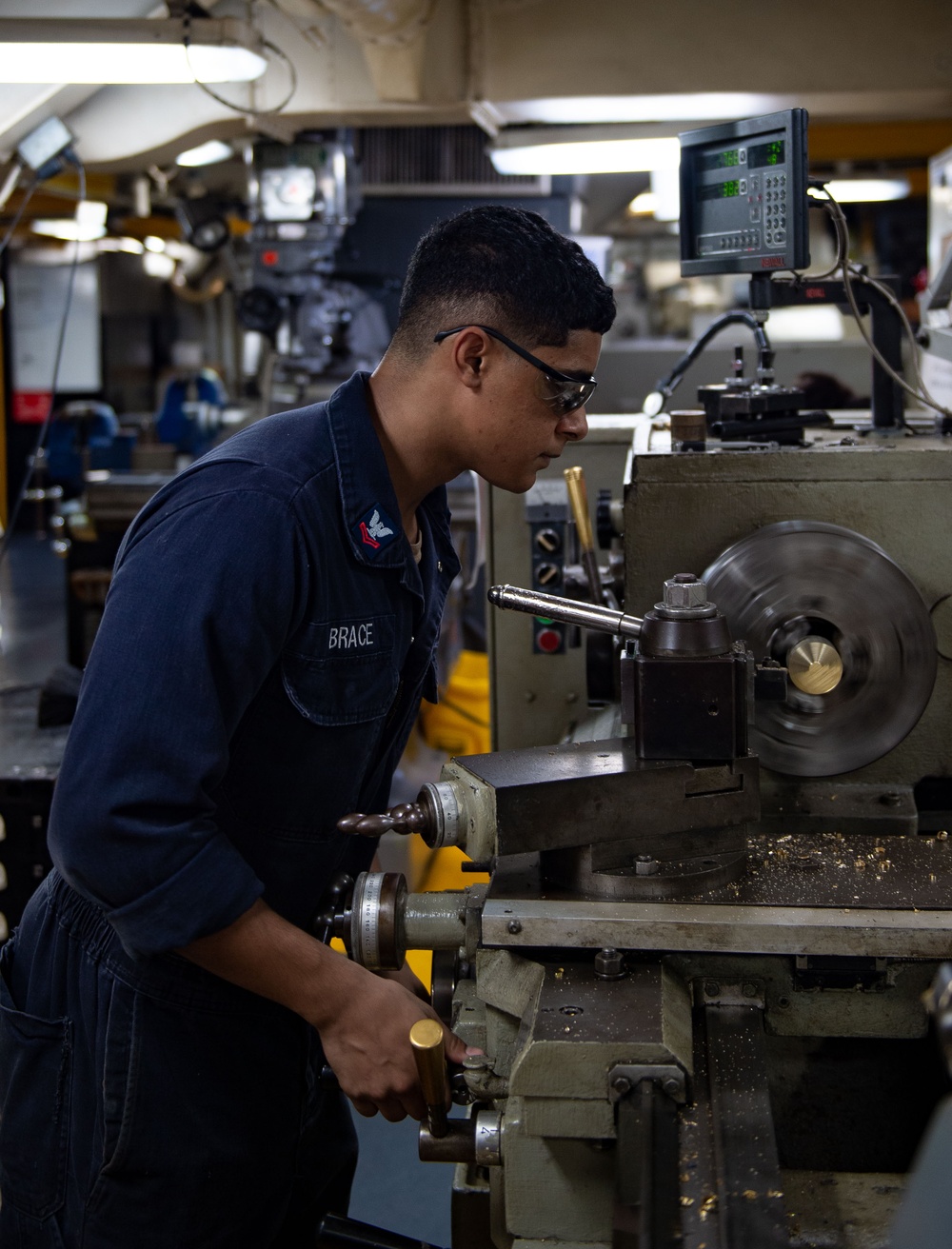 USS Carl Vinson (CVN 70) Sailor Conducts Maintenance in Philippine Sea