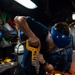USS Carl Vinson (CVN 70) Sailor Repairs Pipe