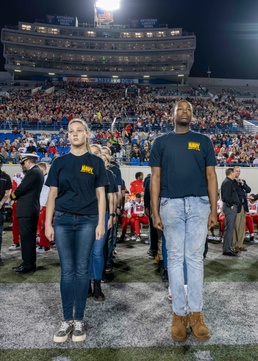 U.S. Navy Recruiters Swear in Future Sailors at Liberty Bowl