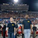 U.S. Navy Recruiters Swear in Future Sailors at Liberty Bowl