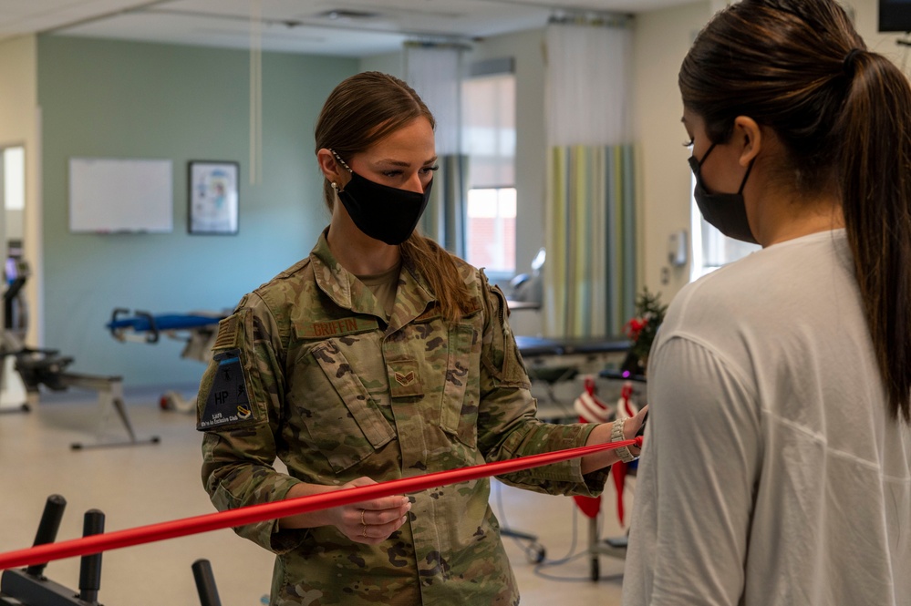 Physical Medicine Technician assists patient