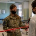 Physical Medicine Technician assists patient