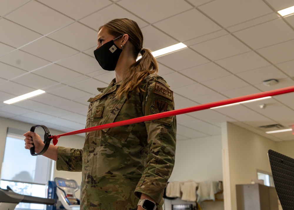 Physical Medicine Technician assists patient