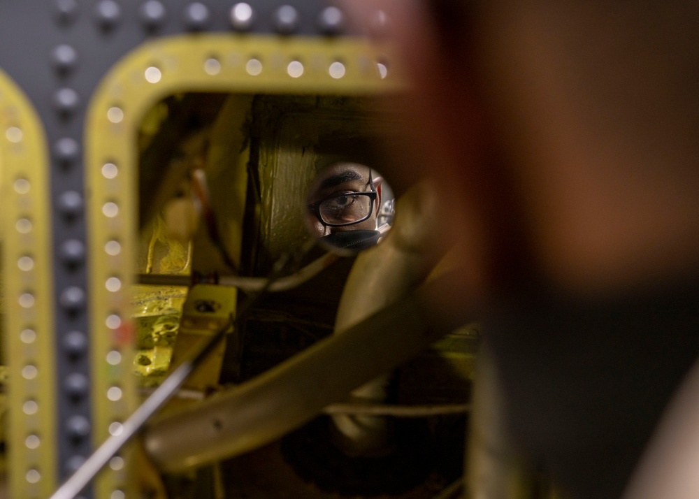 Aircraft fuel system technician maintains F-15E fuel tanks